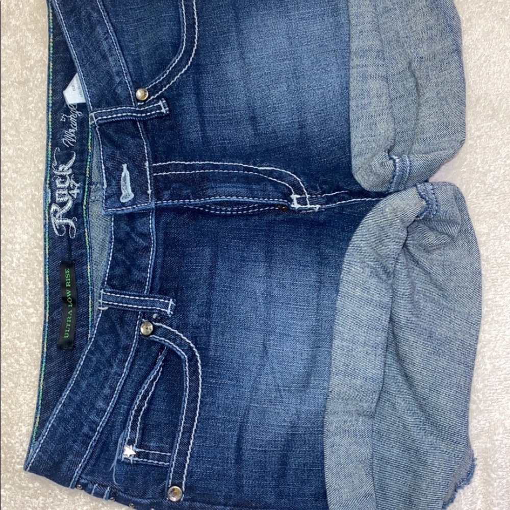 Wrangler Rock 47 embellished jean shorts with crosses  on the pickets. Size 7